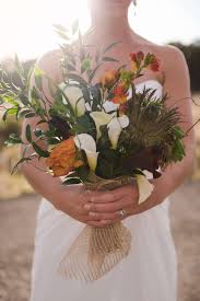 Check spelling or type a new query. A Southwestern White And Burnt Orange Calla Lily Bouquet