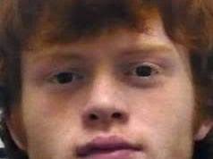 Parents grieve slain son as teen son faces murder charge