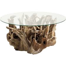 Stash coasters, remote controls, and spare chargers out of sight with this modern storage coffee table. Ethnic Wooden Coffee Table Roots Kare Design