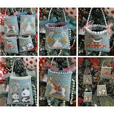 To make cross stitch ornaments you can either gather the materials and patterns yourself, or you can simply purchase a cross stitch kit. Christmas Mini Bag Ornaments Cross Stitch Pattern Stitched Modern
