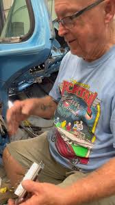 84 year-old man repairs window wiring