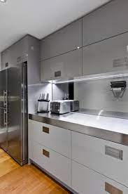 Contemporary white kitchen with gray tile floors stuff via pinterest.com. Modern Kitchen Gray Kitchen Design Ideas