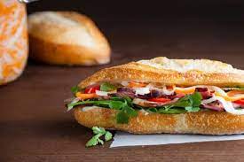 In vietnamese cuisine, bánh mì or banh mi is a short baguette with thin, crisp crust and soft, airy texture. Khai Giáº£ng Khoa Há»c Lam Banh Mi Viá»‡t Nam Banh Mi áº©m Thá»±c Mi