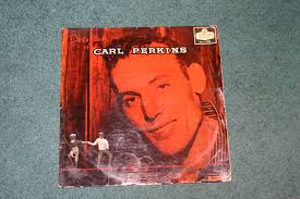Who was Carl Perkins and what was his significance in rockabilly music?
