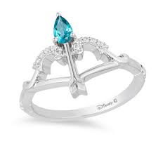 Enchanted Disney Merida Pear Shaped Blue Topaz And 1 20 Ct T W Diamond Bow And Arrow Ring In Sterling Silver Size 7