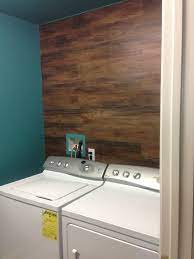Vinyl tile flooring has usually been designed to resemble slate and stone floors, which also usually come in square cuts. My Wife Used Fo Wood Vinyl Flooring On The Wall Flooring On Walls Vinyl Flooring Bathroom Wall Coverings