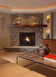 We Will Have A Corner Fireplace And We D Like Some Kind Of Stone Surround Like This Corner Fireplace Living Room Corner Stone Fireplace Basement Fireplace