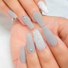 For simple yet chic nails, paint your nails with light pink, but for one finger make use of black and white enamel to give a marble effect. The Best Gray Nail Art Design Ideas Stylish Belles