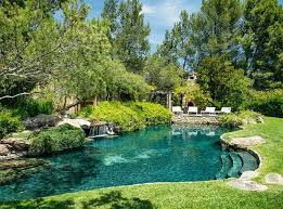 No Star Home Is Complete Without A Pool But Actor Jeff Bridges Went One Step Further His Pool Backyard Pool Swimming Pool Landscaping Natural Swimming Pools