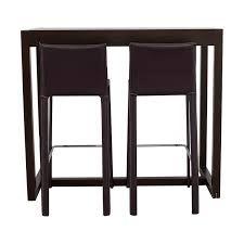 Adjustable industrial swivel stool adjustable industrial backless swivel stool quad pod stool oak wood saddle barstool gold dipped barstool. 88 Off West Elm West Elm Bar Table With Bar Stools Tables