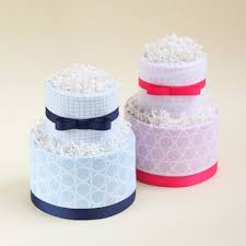 I personally would prefer a snickers poke cake at my baby shower but diaper cakes are definitely cuter. Easy Diaper Cake Instructions Anyone Can Make