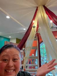 Oi! What has Liz gotten herself into trying to hang ceiling fabric the  night before we open?? Stop by at 10:45 our ribbon cutting with  @cityofmilwaukie Mayor Lisa Batey! We are open