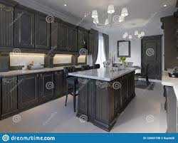 black cabinets and white marble worktop
