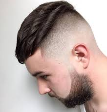 As the name implies, the men's fade haircut involves a close trim with hair clippers at the bottom of the head, gradually blending into the hair on top. Best Hairstyle For Men Who Are With The Flat Head At The Back Katrin Lars