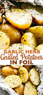 Garlic Herb Grilled Potatoes In Foil Garlic Thyme Rosemary Make These Potatoes So Delicious And Th Foil Potatoes On Grill Grilled Dinner Grilling Recipes