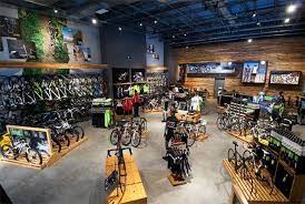 Cycling Sports Group Uses Graphics To Enhance Their Brand Enhance A Colour Bicycle Shop Bike Shop Shop Interiors