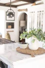 Wood grain cabs, cream or light grey. Modern Farmhouse Kitchen Counter Vignette Kitchen Island Decor Kitchen Counter Decor Home Decor Kitchen