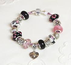 Here is a collection of the available pandora style charms separated by category and type. Ladies Black Pink Heart European Pandora Style Charm Bracelet Etsy Pandora Style Charms Charm Bracelet European Charm Bracelets