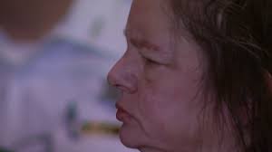 Police: Monroe woman lived with corpse