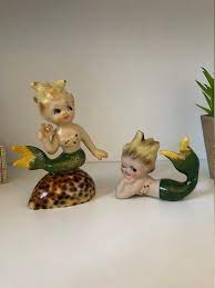 Resin kneeling mermaid with blue & green swirl tail nautical kneeling mermaid is made of white resin with a blue & green tail and measures 7.75 x 4.75 x 8.75 and is a great accent for anyone who loves mermaid or the sea. Vintage Mermaids Ceramic Mermaids Mermaid Figurines Japan Etsy Mermaid Figurine Mermaid Decor Vintage Mermaid