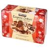 Drizzled cooled cookies with glaze made with powdered sugar powdered ginger and orange juice. 1