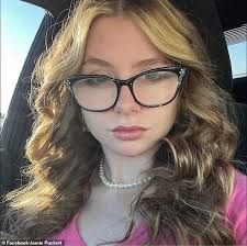 Missing girl, 17, is found dead in woods near busy road