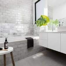These designer tiles have a rectified edge which means grout lines can be narrow perfect for a seamless look in open plan living. Harewood Light Grey Wall Tiles 10x20cm 2 Sq Meters A Bag Of Silver Grout 2kg Ebay