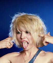 A very long shot. This is a photo of a lady called Debbie taken in 1979 in  the UK, most likely in London. Would anyone here be able to help direct me