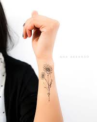 In buddhist symbolism the lotus is symbolic of purity of the body, speech, and mind as while rooted in the mud, its flowers blossom on long stalks as if floating above the muddy waters of attachment and desire. 43 Beautiful Flower Tattoos For Women Page 3 Of 4 Stayglam