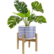 Whether you prefer traditional styles or modern designs, these are brilliant for showcasing your plants. Amazon Com Large Ceramic Plant Pot With Stand 9 4 Inch Modern Cylinder Indoor Planter With Drainage Hole For Snake Plants Fiddle Fig Tree Artificial Plants Blue White Home Kitchen