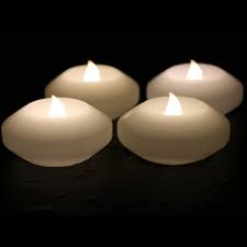 Amazon Com Ardux Christmas Led Floating Candles 3 Inch Wax Waterproof Candle Tealight Night Light Flameless Candle With Battery Powered For Wedding Party Decoration Pack Of 4 Home Kitchen