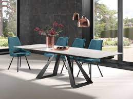 escape a une table extensible absolument exceptionnelle le plateau en ceramique est propose en 3 coloris anthracite marbre gris clair marbre ou blanc vein