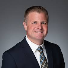 Trustee William Riley