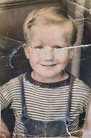 Hi everyone first time poster 😀 this is the only photo we have of my  father in law as a child could someone kindly help me restore it back to  its natural