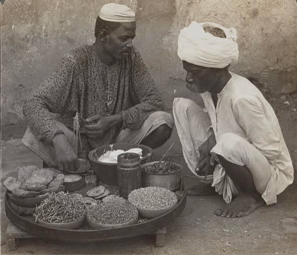 A sweet-seller, Jaipur, India— photograph circa 1905. Selling Mawa kachori?