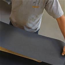Once you've dropped the sticky grip, drop the palm of your hand on the center of the board and press the sheet down firmly. Diy How To Apply Grip Tape The Longboard Store