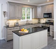 This Eclectic Design Features Driftwood Cabinets Cream Island Granite Countertops And A Cer Grey Kitchen Floor Stools For Kitchen Island Grey Kitchen Island