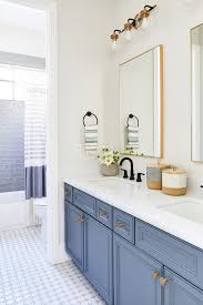 5 out of 5 stars. White And Blue Bathroom With Gold Mirrors Transitional Bathroom