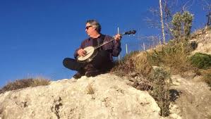 Retired firefighter's new mission: 'Play my banjo in as many different  countries as possible'