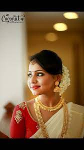 Indian Bride Kerala Bride Kerala Wedding Mallu Wedding Muhurtam Looks Temple Wedding Set Saree Kerala Bride Reception Dress For Bride Indian Kerala Saree