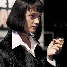Uma Thurman is Mia Wallace, the mischief-making mafia boss's wife in  Quentin Tarantino's 1994 cult classic "Pulp Fiction." Costume designer  Betsy Heimann dressed Thurman in a custom-made white shirt, a velvet coat