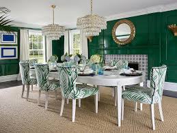 The wall is covered in green grass cloth wallpaper. Glossy Emerald Green Walls With Emerald Green Fireplace Mantel Transitional Dining Room