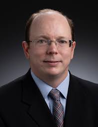 Software Project Management for the Defense Advanced Research Projects  Agency Spectrum Collaboration Challenge