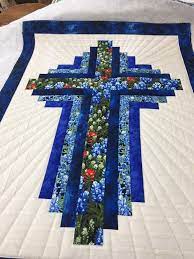 The quilt is easy to make even for beginner quilters. Log Cabin Cross Quilt By Lake Area Quilts Jasper Texas Cross Quilt Quilts Quilt Patterns