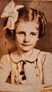 My Grandmother...first picture when she was approximately 10yrs old in  1917...and the second when she was 20 yrs old. She passed away in 2010 at  103yrs old....miss her every day!