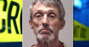 Man charged with beating elderly mother