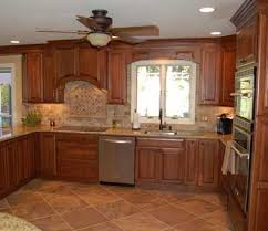 Shelburne Door Style In Cherry Finished In Nutmeg Cherry Finish Brown Kitchens Kitchen And Bath
