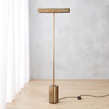 Inspired by modern sculpture, it elevates a living room or refined home office with its luxurious texture and substantial figure. Shop Lectura Antique Bronze Floor Lamp Beautiful Antique Brass Finish Gives This Floor Lamp By Mermelada Estud Bronze Floor Lamp Modern Floor Lamps Floor Lamp