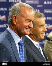 Atlanta Braves interim general manager John Hart, left, and team president  John Schuerholz smile during a news conference Monday, Sept. 22, 2014, in  Atlanta. The Braves fired general manager Frank Wren on