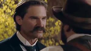 Back of the grave, where it allegedly "bleeds."